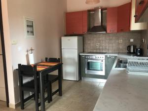 Kuchyň nebo kuchyňský kout v ubytování Lotus Sea View Studio Apartment 2