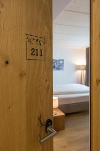 Postel nebo postele na pokoji v ubytování Hotel Reuti