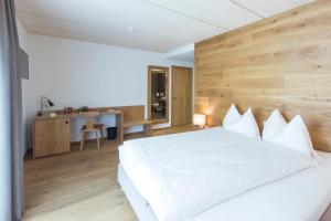 Postel nebo postele na pokoji v ubytování Hotel Reuti