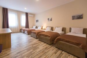 Postel nebo postele na pokoji v ubytování Hotel Hana