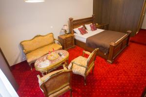 Postel nebo postele na pokoji v ubytování Hotel Hana