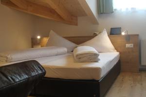 A bed or beds in a room at Apart Corona