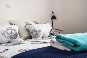 Posteľ alebo postele v izbe v ubytovaní Blue Pearl apartment