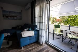 Posedenie v ubytovaní Blue Pearl apartment
