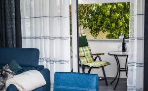 Posedenie v ubytovaní Blue Pearl apartment