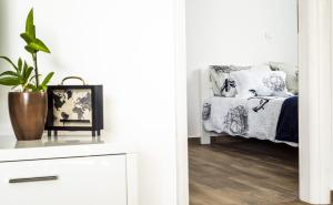 Posteľ alebo postele v izbe v ubytovaní Blue Pearl apartment