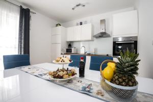 Kuchyňa alebo kuchynka v ubytovaní Blue Pearl apartment