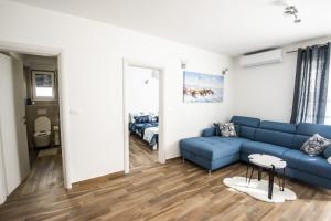 Posedenie v ubytovaní Blue Pearl apartment