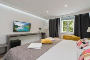 Posteľ alebo postele v izbe v ubytovaní Tia Apartments and Rooms