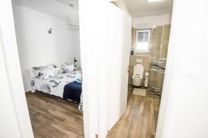Posteľ alebo postele v izbe v ubytovaní Blue Pearl apartment