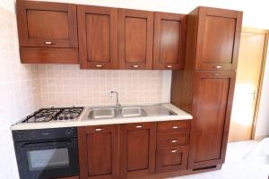 A kitchen or kitchenette at Masseria Fagà