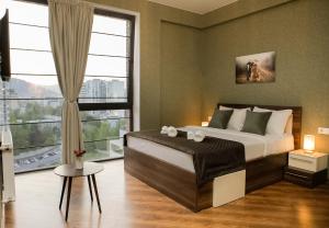 Postel nebo postele na pokoji v ubytování Boutique Hotel