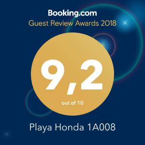 a greetings card for the guest review awards with a yellow circle at Playa Honda 1A008 in Playa de las Americas