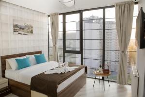 Postel nebo postele na pokoji v ubytování Boutique Hotel + 37 fotografií