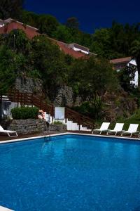 The swimming pool at or near Villa Termal Monchique - Central Suites & Apartments - by Unlock Hotels