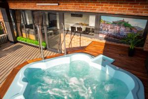 Bazén v ubytování Boutique Hotel nebo v jeho okolí