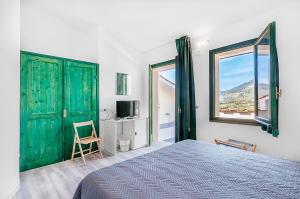 Voodi või voodid majutusasutuse Hotel Capo Di Stella toas
