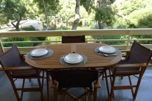 Балкон или терраса в Deluxe Apartment in Vouliagmeni