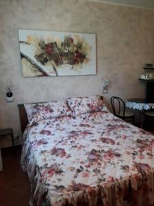 A bed or beds in a room at Villa Fabbri