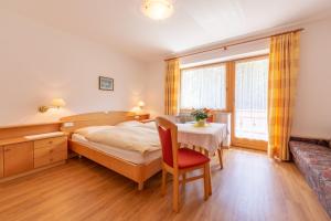 Posteľ alebo postele v izbe v ubytovaní Residence Trenker Luis