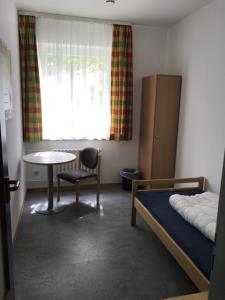 Postel nebo postele na pokoji v ubytování Jugendherberge Göttingen