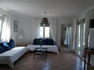 Postel nebo postele na pokoji v ubytování Villa Kos