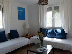 Postel nebo postele na pokoji v ubytování Villa Kos