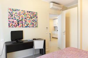 Łóżko lub łóżka w pokoju w obiekcie City Residence