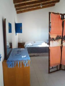 Posteľ alebo postele v izbe v ubytovaní BLU DIPINTO DI BLU