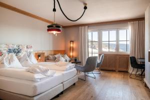 Postel nebo postele na pokoji v ubytování Hotel Hirzer 2781 + 37 fotografií