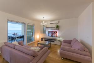Posezení v ubytování Penthouse Jure