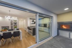 Kuchyň nebo kuchyňský kout v ubytování Penthouse Jure