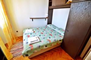 Postel nebo postele na pokoji v ubytování Apartman Martina