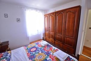 Postel nebo postele na pokoji v ubytování Apartman Martina