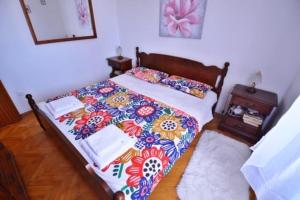 Postel nebo postele na pokoji v ubytování Apartman Martina