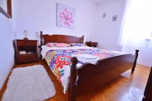 Postel nebo postele na pokoji v ubytování Apartman Martina