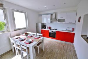 Kuchyň nebo kuchyňský kout v ubytování Apartman Martina