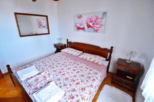 Postel nebo postele na pokoji v ubytování Apartman Martina
