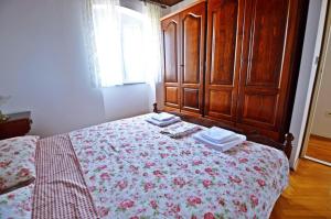 Postel nebo postele na pokoji v ubytování Apartman Martina