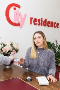 Goście zatrzymujący się w obiekcie City Residence