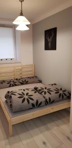 Katil atau katil-katil dalam bilik di Próchnika 49 Rooms