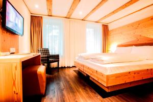 Letto o letti in una camera di Gasthaus zur Waldegg