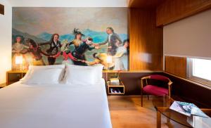 Postel nebo postele na pokoji v ubytování Hotel Goya