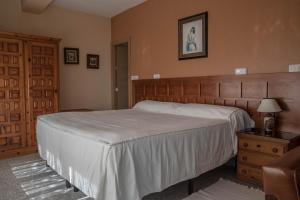 Cama o camas de una habitación en Hotel Galicia