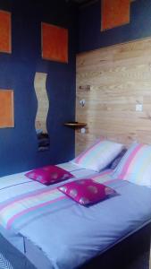 Postel nebo postele na pokoji v ubytování Le patio d'Eric B&B