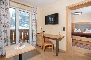 Letto o letti in una camera di Seehotel St Hubertus