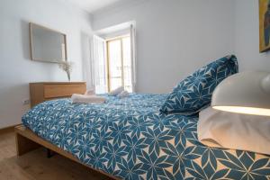 Postel nebo postele na pokoji v ubytování Apartamento La Galeria de San Antonio