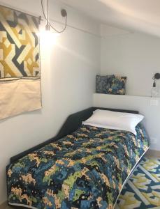 Postel nebo postele na pokoji v ubytování L'Incanto Luxury Rooms