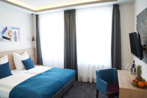 Postel nebo postele na pokoji v ubytování Hotel Dias