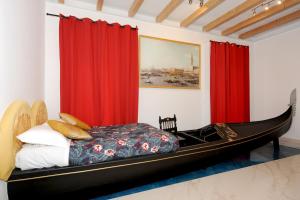 Кровать или кровати в номере I Grandi Maestri